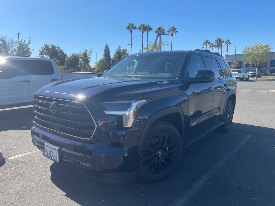 Dark blue 2026 Toyota Sequoia SUV, front three-quarter view