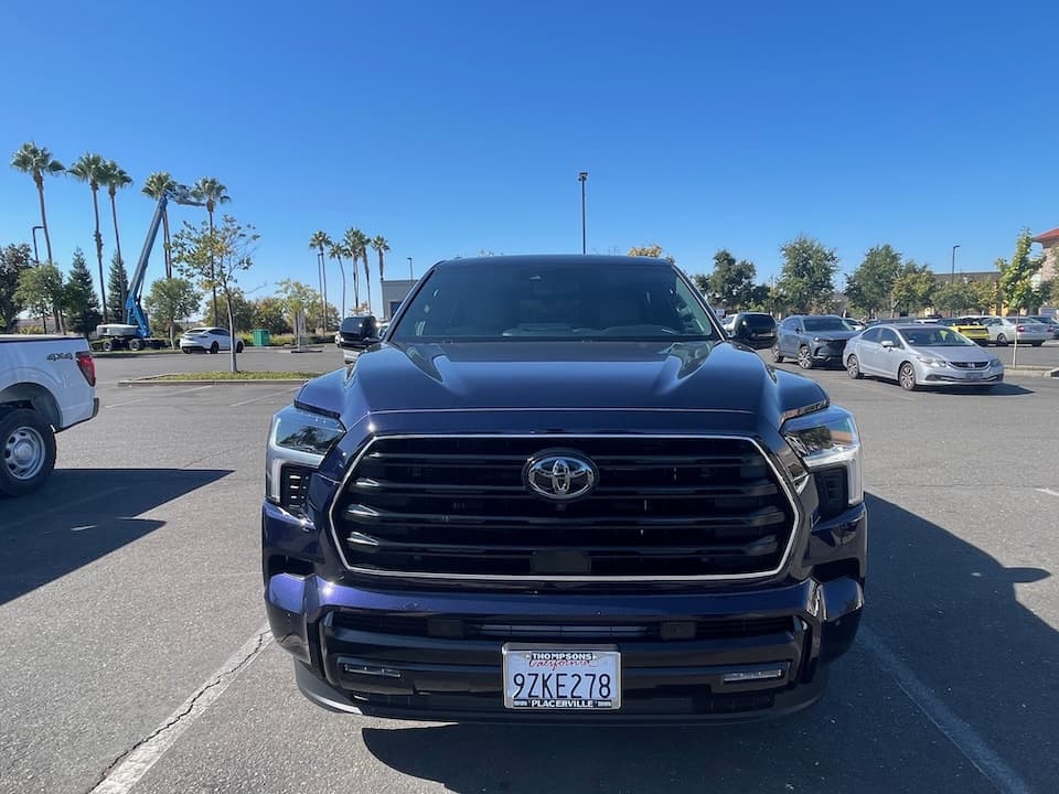 Dark blue 2026 Toyota Sequoia SUV, head-on front view