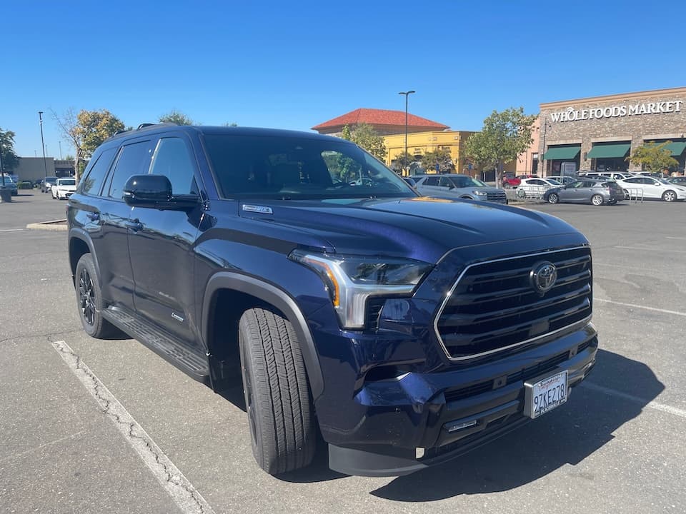 Dark blue 2026 Toyota Sequoia SUV, close front three-quarter view