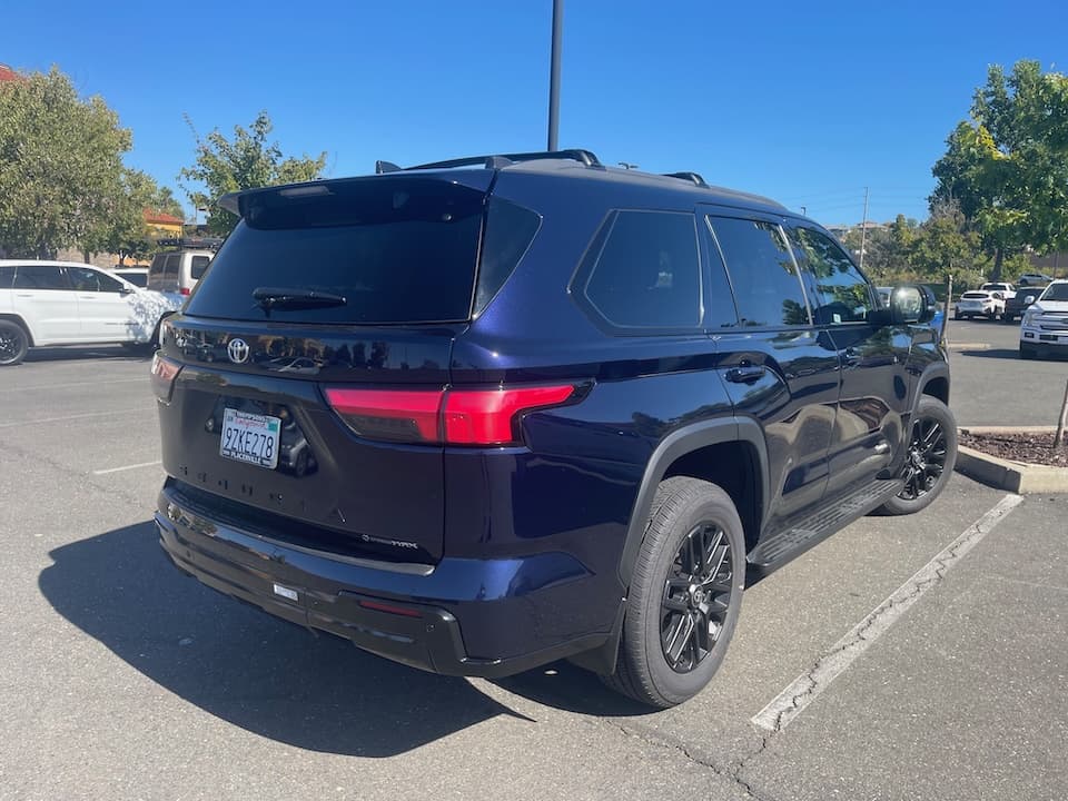 Dark blue 2026 Toyota Sequoia SUV, rear three-quarter view