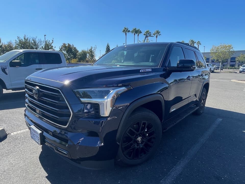 Dark blue 2026 Toyota Sequoia SUV, low front three-quarter view