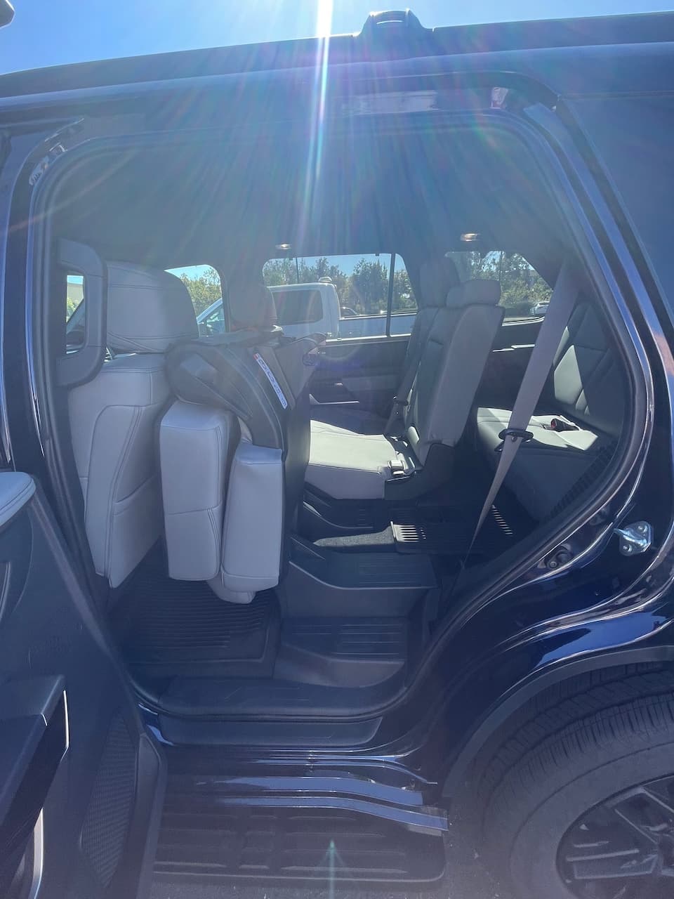 Open rear door of the 2026 Toyota Sequoia showing easy access to the back rows